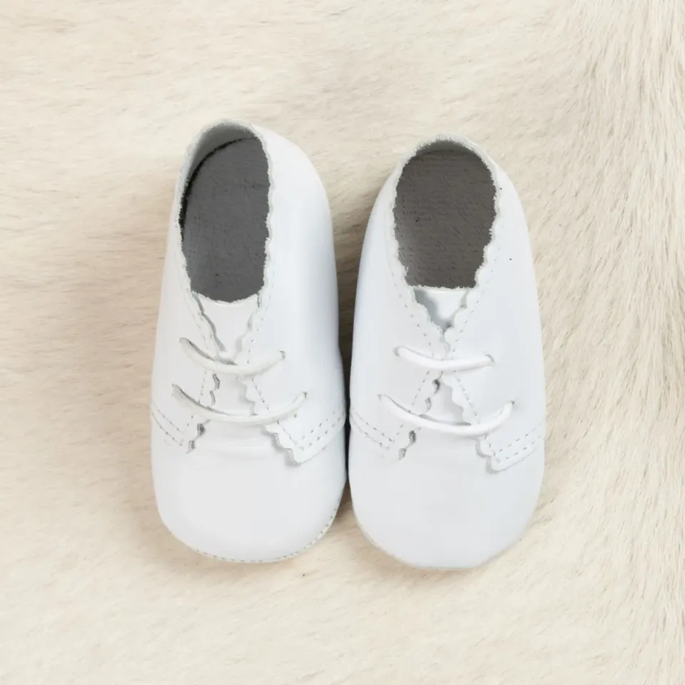 Le Petit Fils du Cordonnier Clark chausson bébé cuir